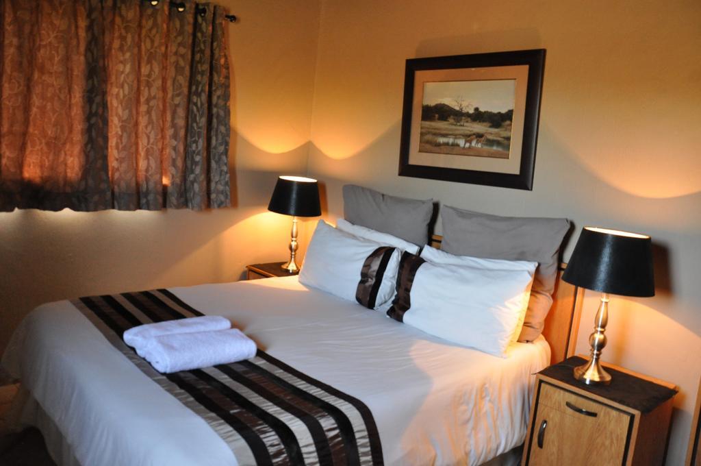 Ukutula Lion Lodge Beestekraal  Zimmer foto